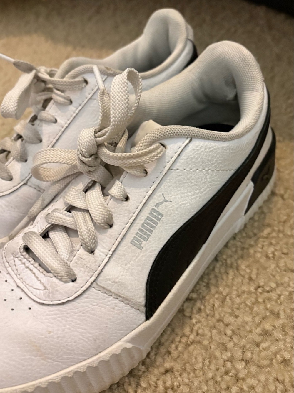 Puma women’s White & Black Low-Top Sneakers